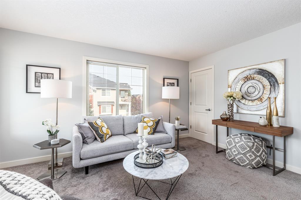 Interior living room repaint by Johnny B’s Painting in Calgary showing modern neutral colour update and detailed trim work