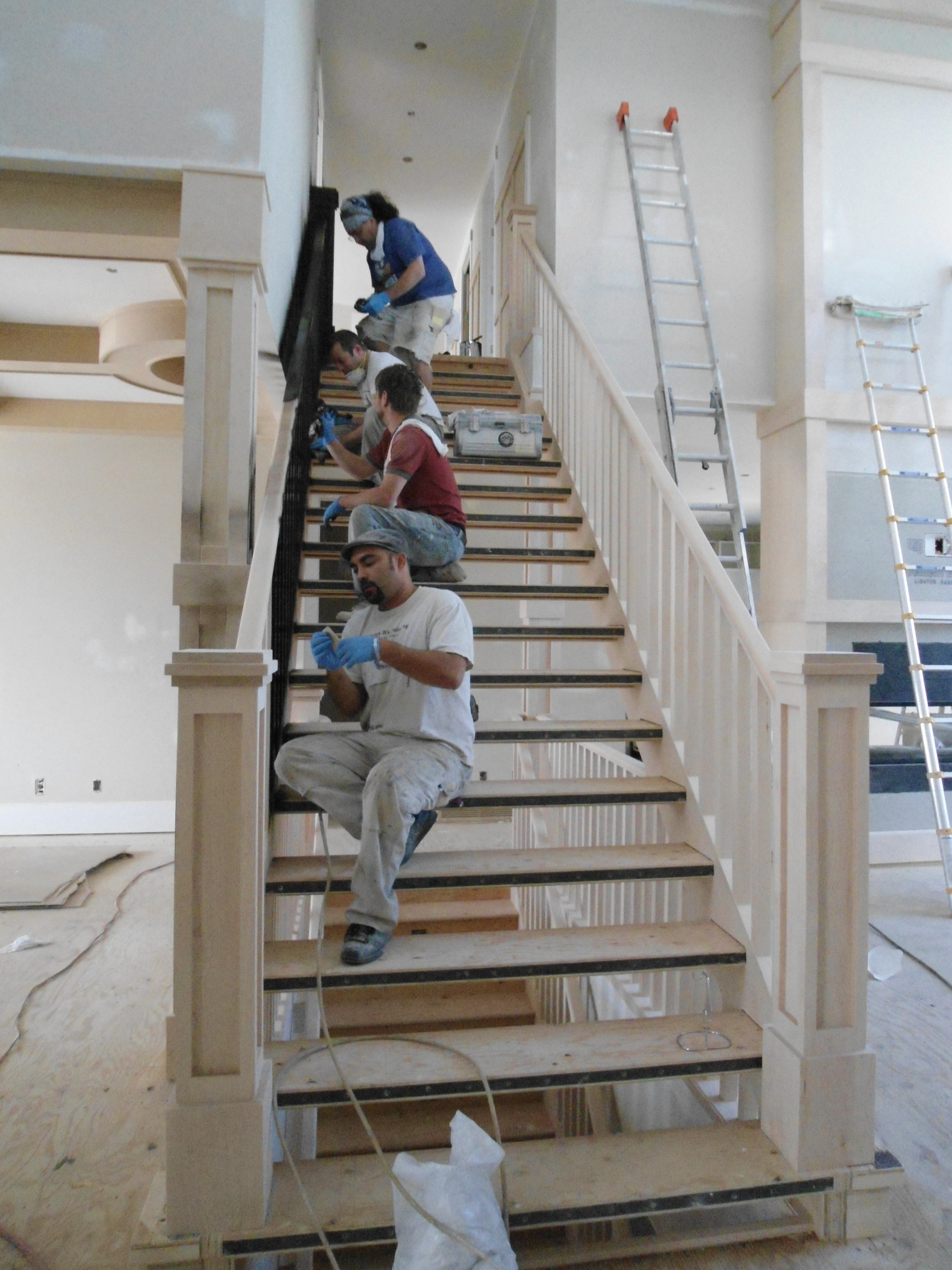 Calgary Painters Staining a railing